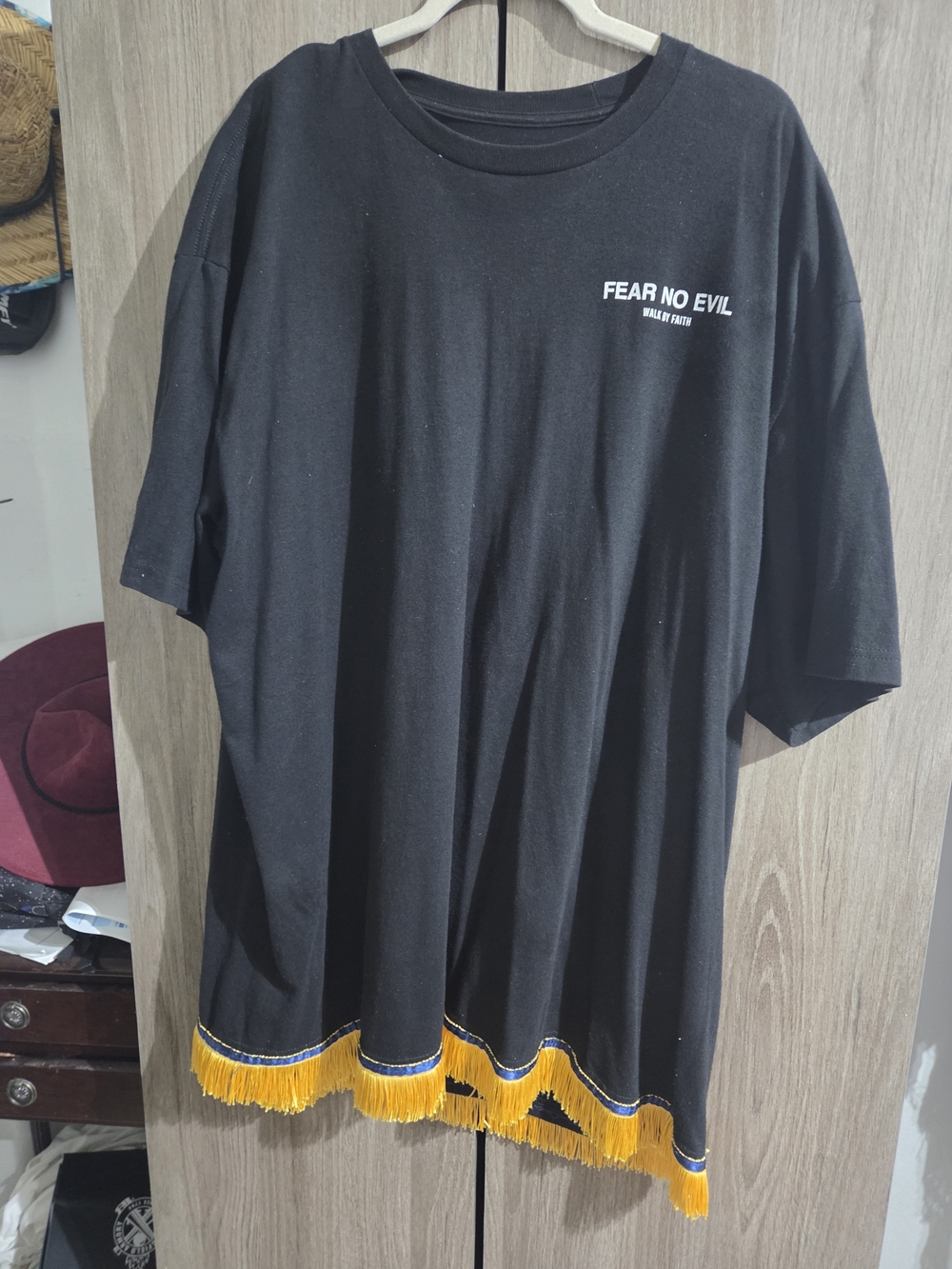 Twisted Black Short-Sleeve Tee with Yellow Fringe